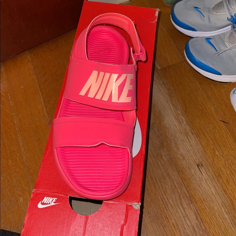 Coral Nike sandals